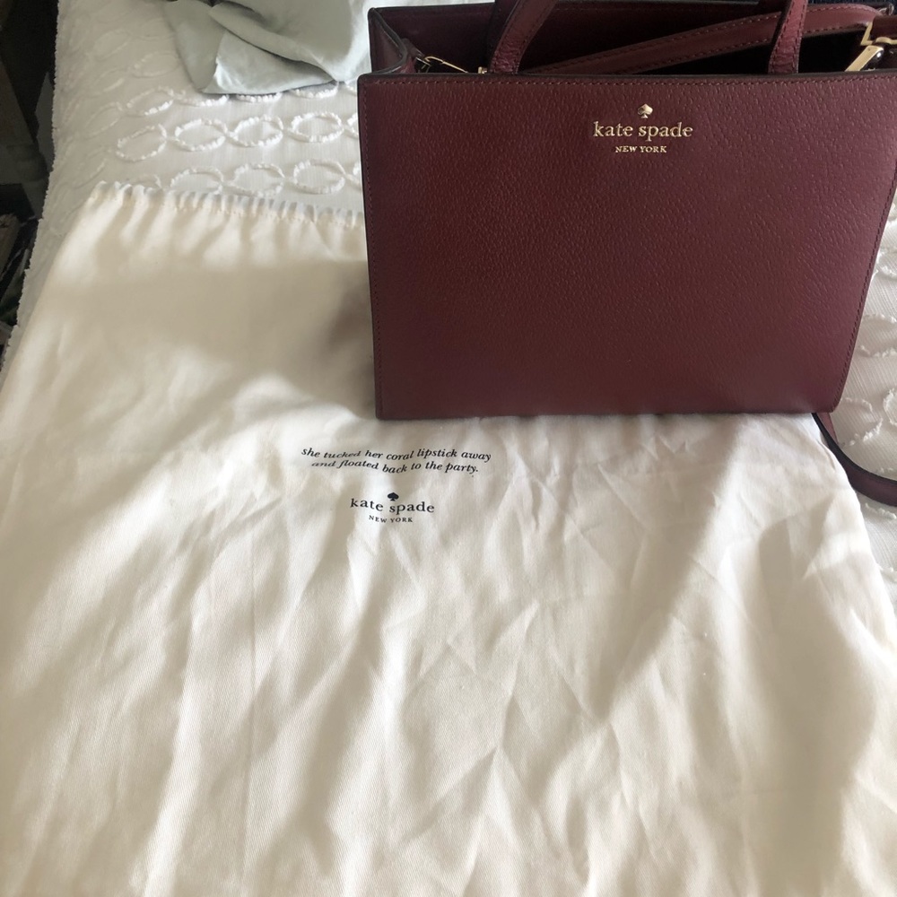 Kate Spade shoulder bag. Excellent condition with storage bag.